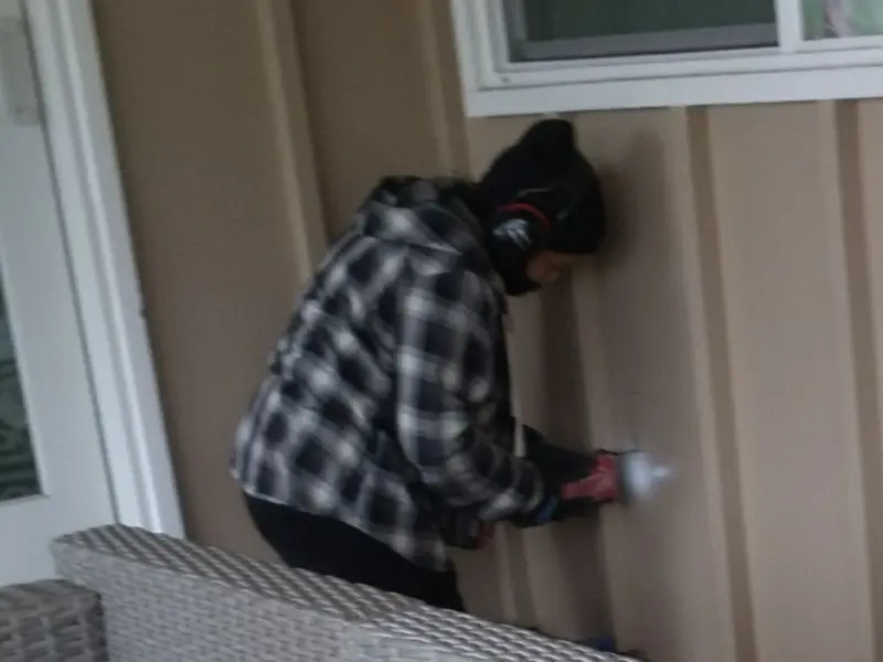 Professional electrician installing an exterior outlet in Montclair